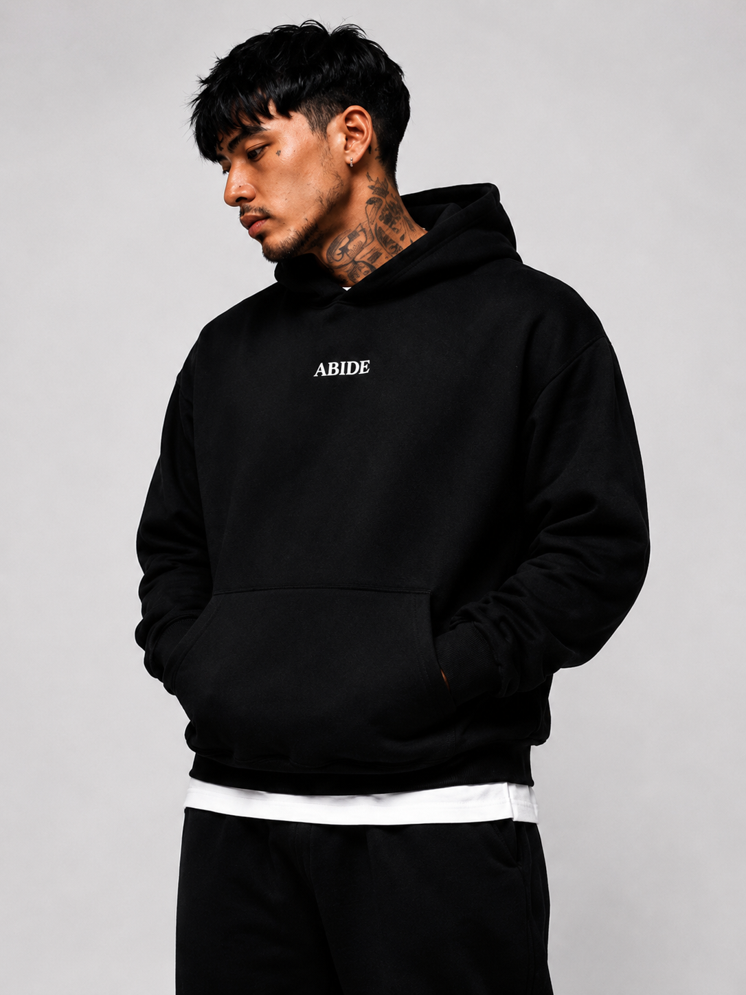 JOHN 15:4 Heavyweight Fleece Hoodie, black, lifestyle photo 2 — Abide Collection, EVERREMINDR CO.