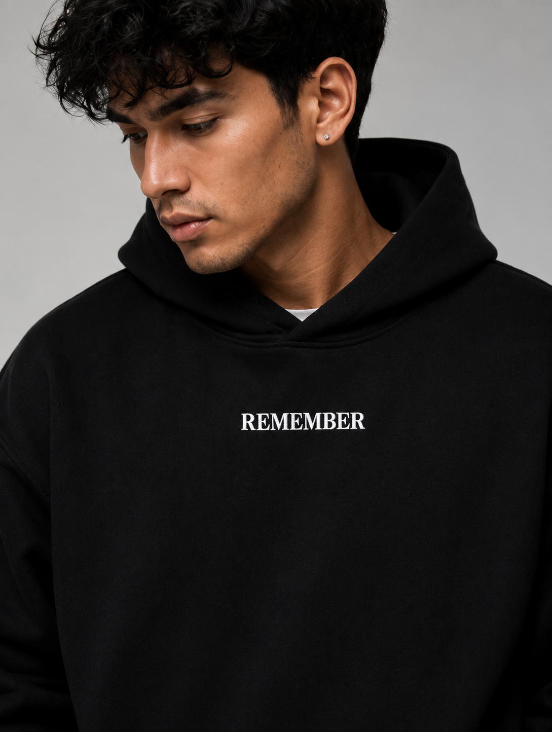 HEBREWS 13:8 Heavyweight Fleece Hoodie, black, lifestyle photo 1 — Remember Collection, EVERREMINDR CO.