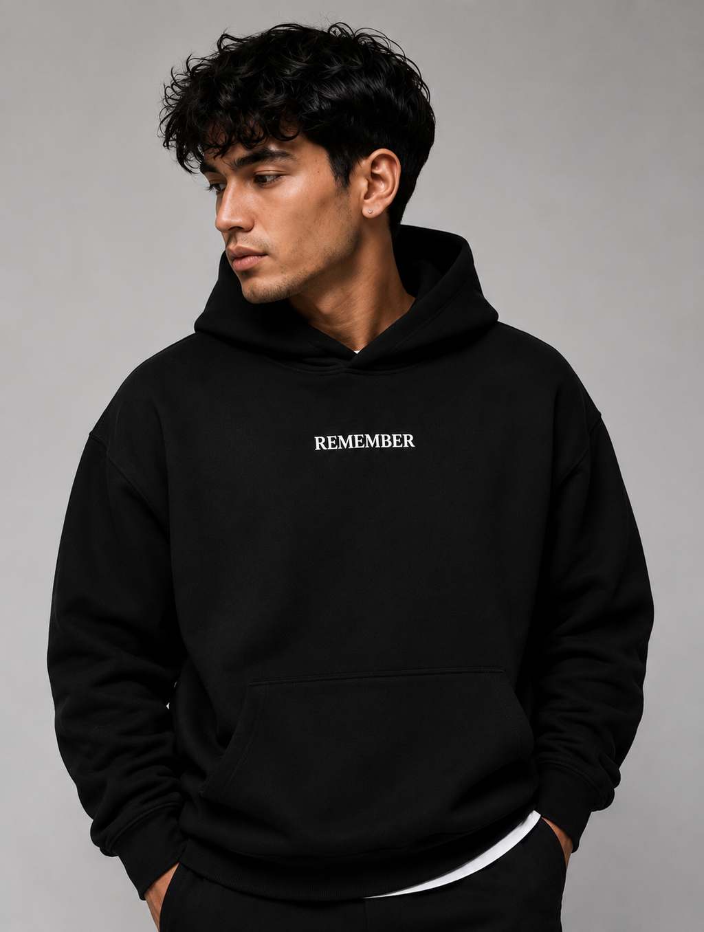 HEBREWS 13:8 Heavyweight Fleece Hoodie, black, lifestyle photo 2 — Remember Collection, EVERREMINDR CO.
